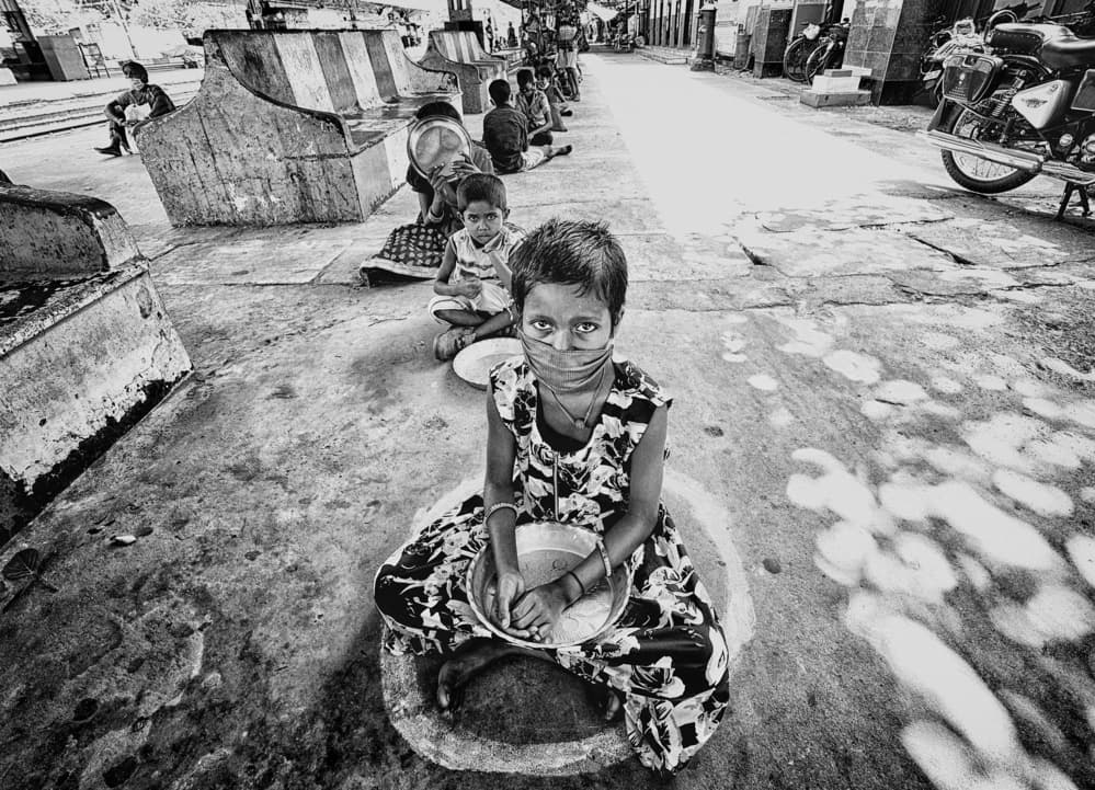 Masked Child Waiting by Avishek Das — canvas wall art