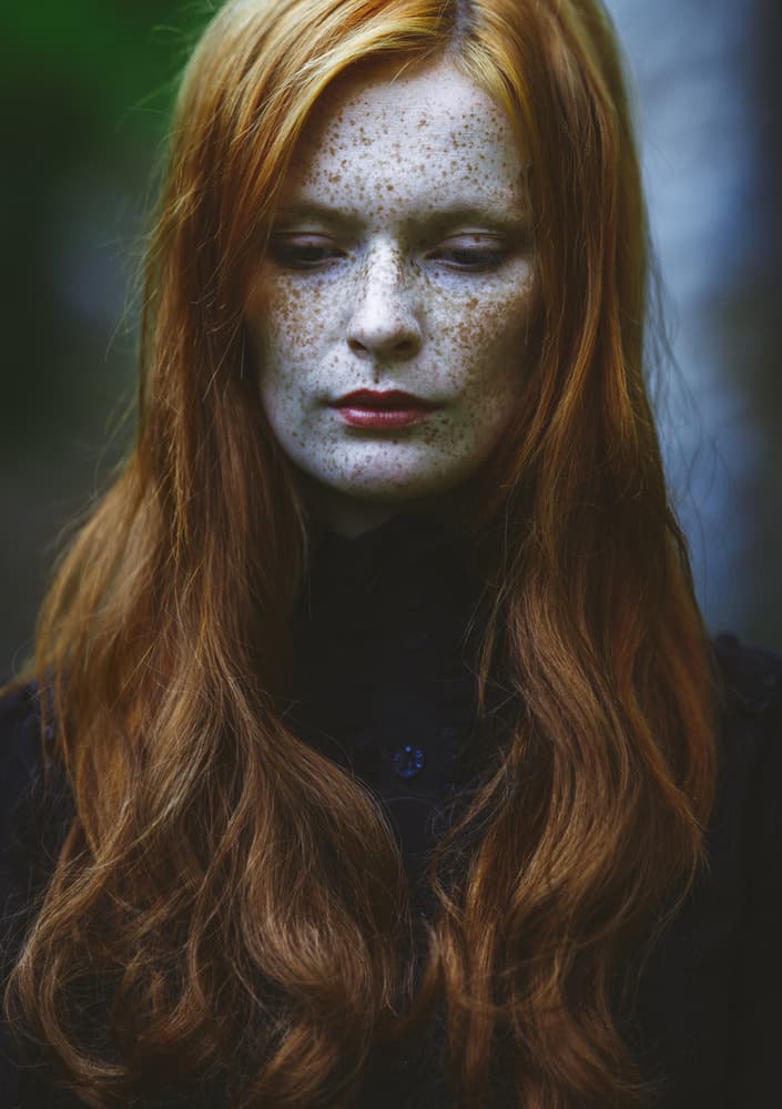 Pensive Redhead Portrait by Magdalena Russocka — canvas wall art