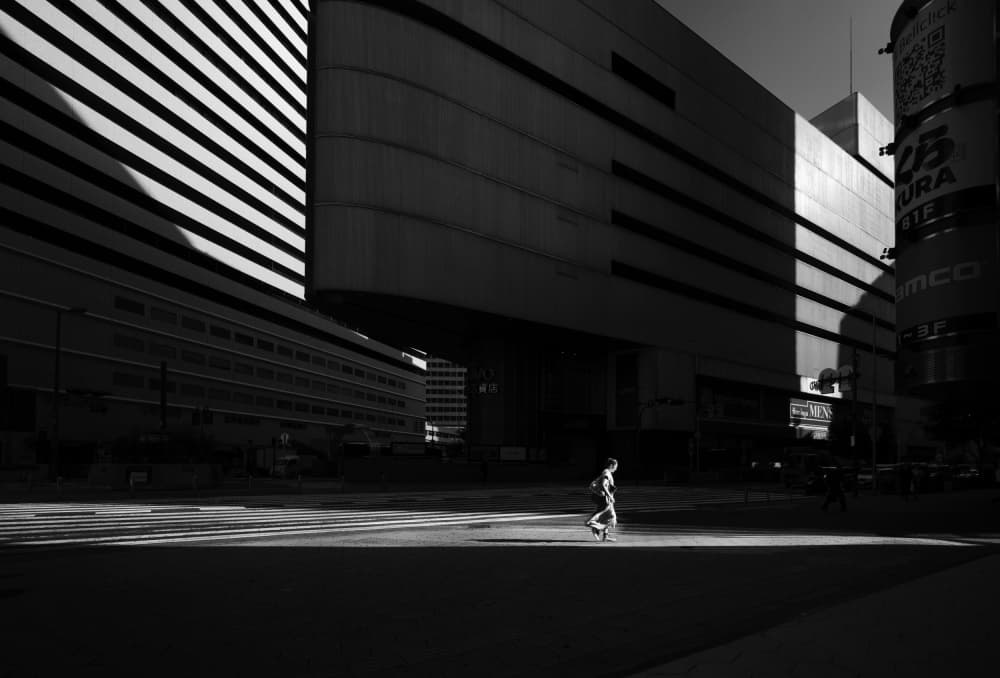 Walking Through City Shadows by Yasuhiro Takachi — canvas wall art
