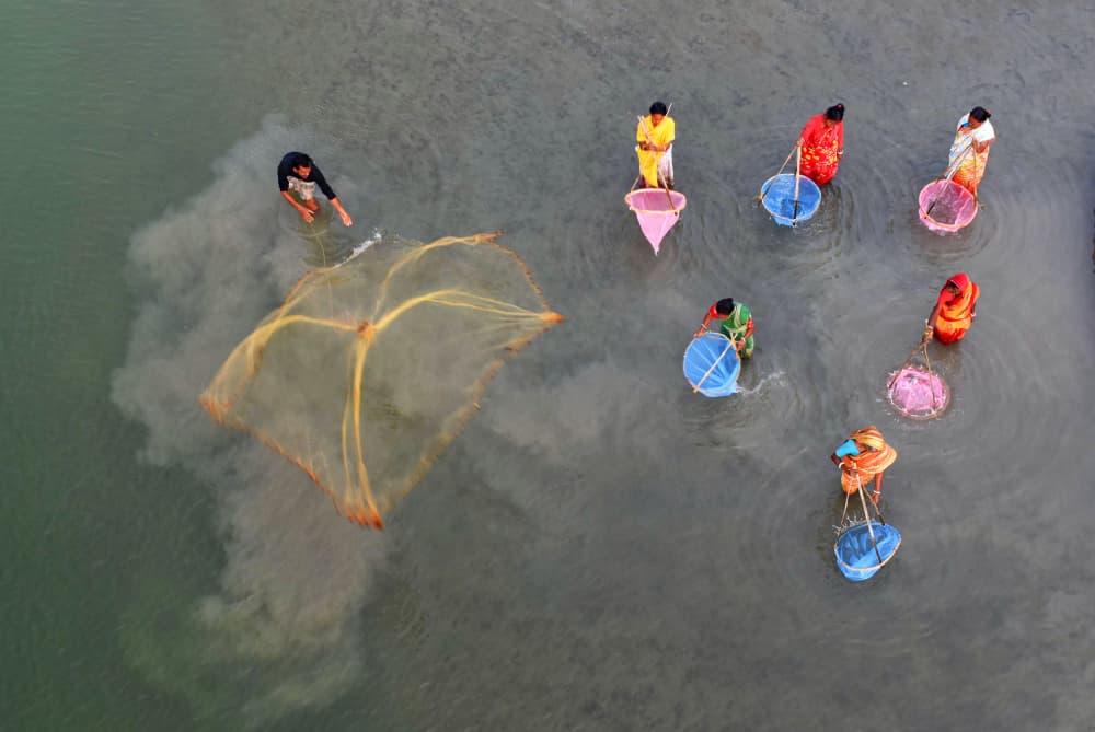 Traditional Fishing Women by Moumita Mondal — canvas wall art
