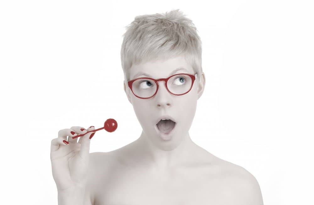 Curious Girl Red Glasses by Alex Ogazzi — canvas wall art