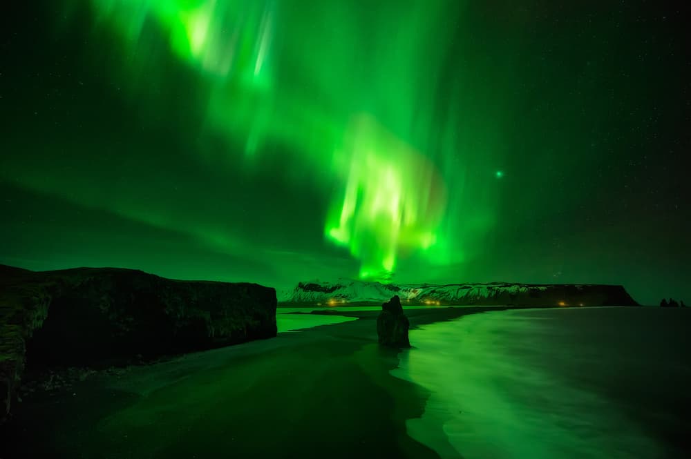 Green Aurora Over Iceland by David Martin Castan — canvas wall art
