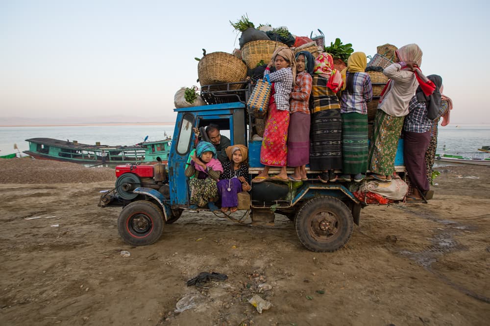 Crowded Truck Journey by Gunarto Song — canvas wall art
