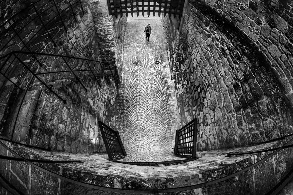 Solitary Figure Castle Gate by Katarzyna Gritzmann — canvas wall art