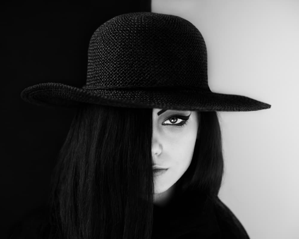 Mysterious Woman Black Hat by Bobby Kostadinov — canvas wall art