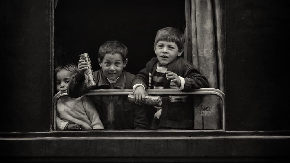 Curious Boys on Train by Yiannis Logiotatides — canvas wall art