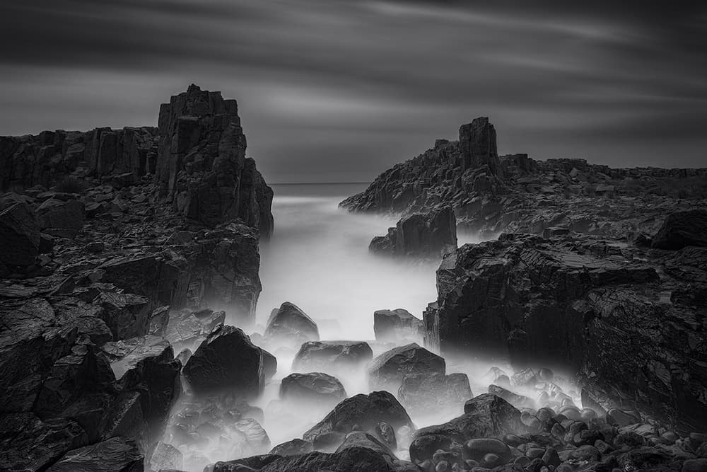 Dramatic Rocky Coast by Jingshu Zhu — canvas wall art
