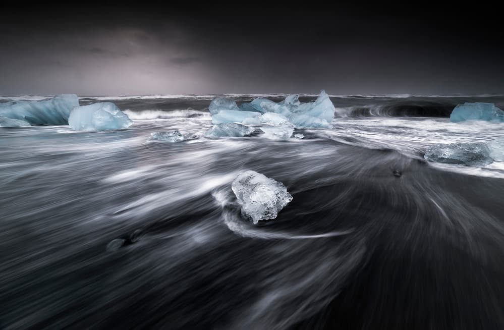Glacial Ice on Black Sand by Jorge Ruiz Dueso — canvas wall art