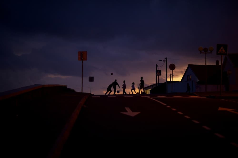 Family Silhouettes at Dusk by Rui Caria — canvas wall art