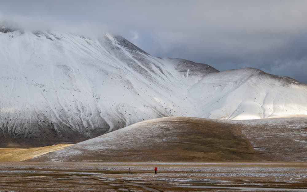 Solitary Figure Winter Mountains by Sergio Barboni — canvas wall art