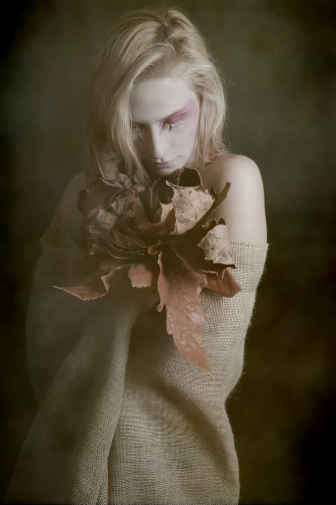 Woman With Autumn Leaves by Olga Mest — canvas wall art