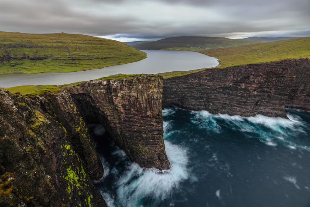 Dramatic Coastal Lake Cliffs by Jie Jin — canvas wall art