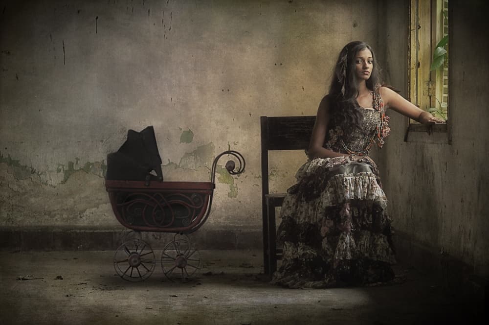 Pensive Woman Vintage Pram by Joey Bangun — canvas wall art