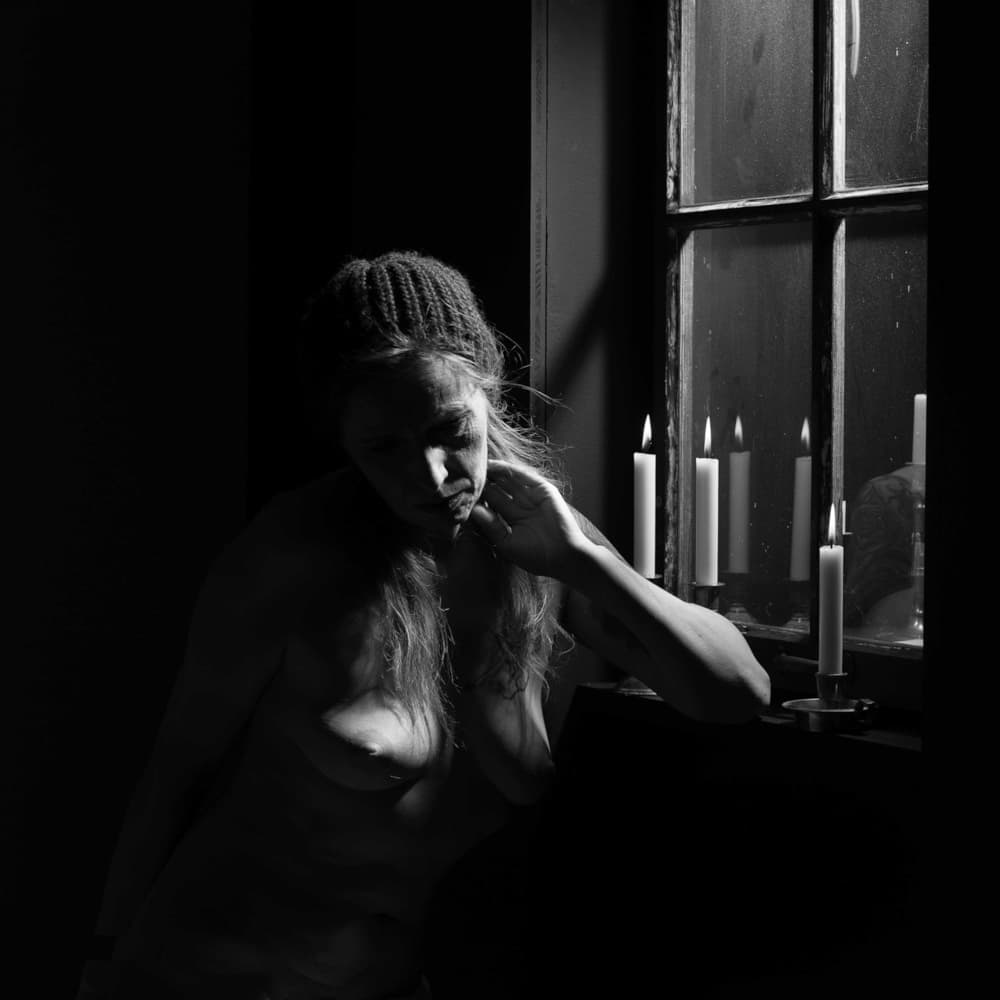 Pensive Woman Candlelight by woodplane — canvas wall art