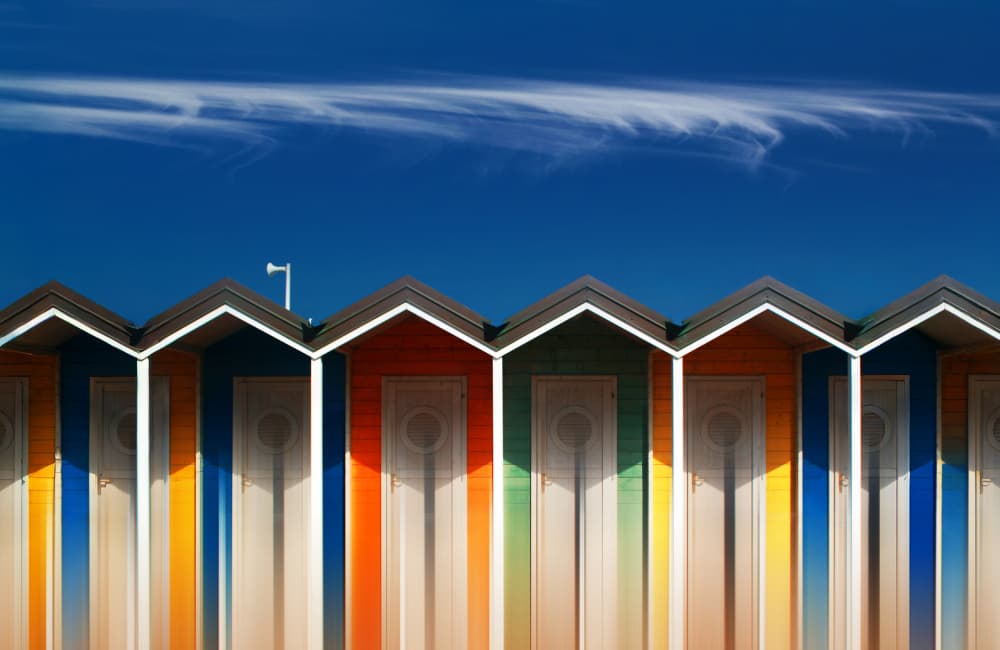 Colorful Beach Huts by Hans-Wolfgang Hawerkamp — canvas wall art