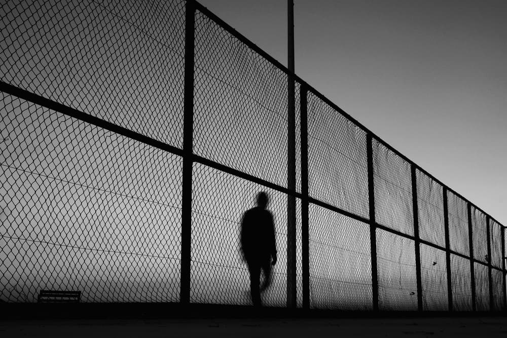 Solitary Figure Silhouette by Ali Ayer — canvas wall art