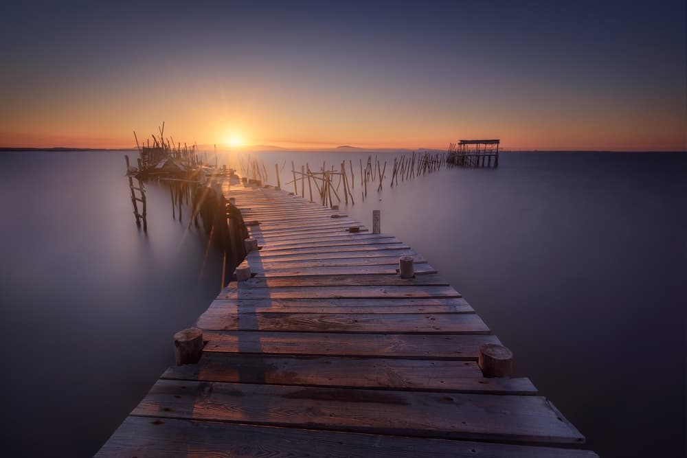 Golden Pier Sunset by Iván Ferrero — canvas wall art