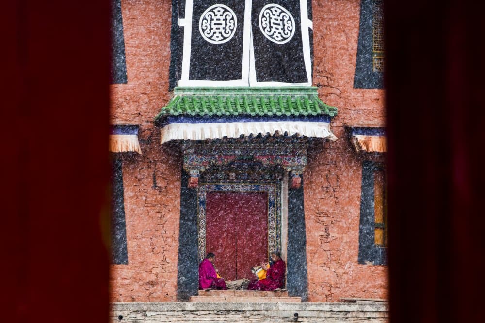 Monks in Snowy Monastery by Xiaoyang Wang — canvas wall art