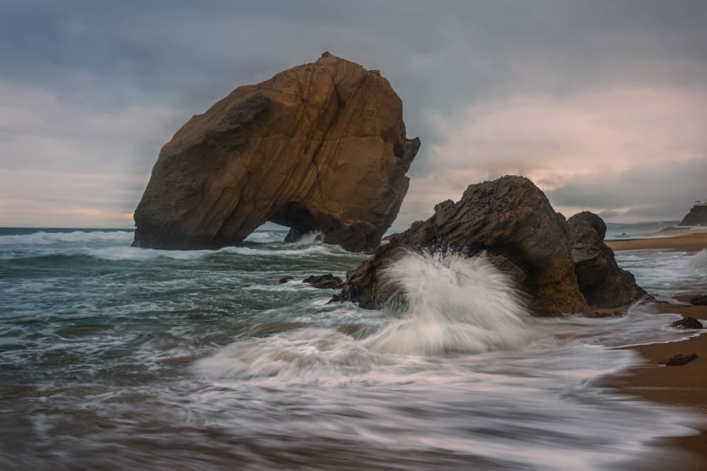 Dramatic Ocean Arch by Xiaoyuan Xu — canvas wall art