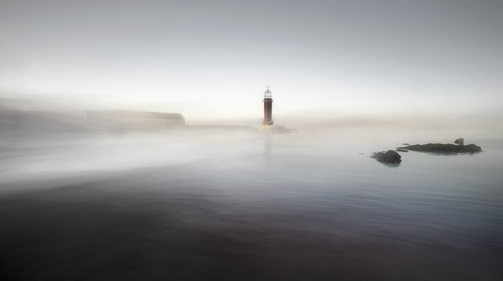 Misty Red Lighthouse by Santiago Pascual Buye — canvas wall art
