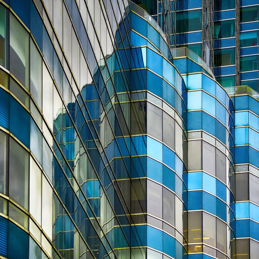 Curved Blue Facade by Mozart Chan — canvas wall art