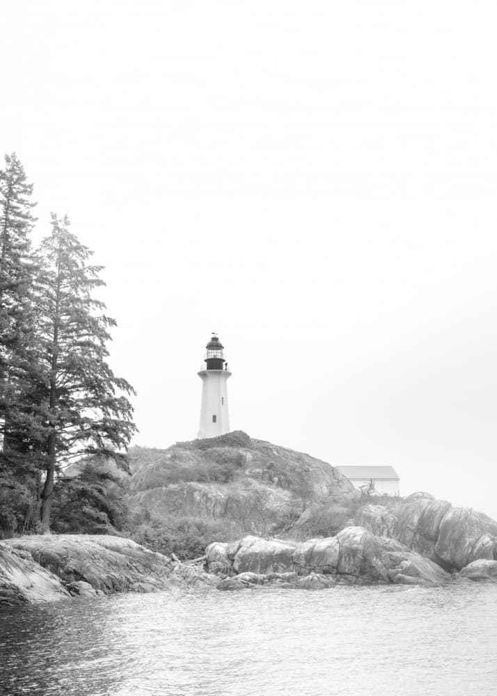 Misty Coastal Lighthouse by Lynann Colligan — canvas wall art