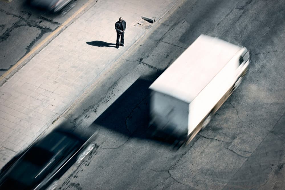 Man Amidst Urban Motion by Hesham Alhumaid — canvas wall art