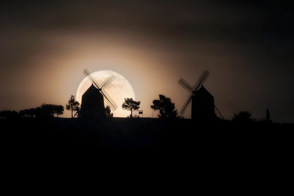 Moonlit Windmill Silhouettes by Tomás Hueso Marco — canvas wall art