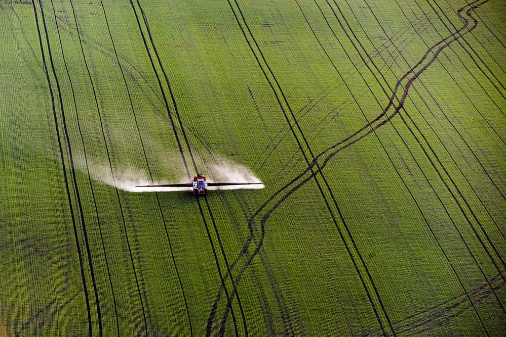 Crop Duster Over Green Fields by Ovidiu Satmari — canvas wall art