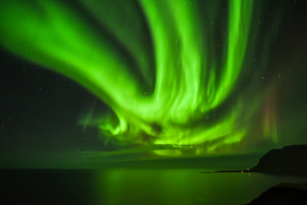 Vibrant Green Aurora Sky by Rui Wang — canvas wall art