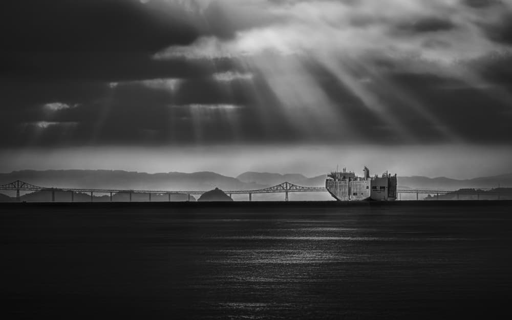 Ship Under Sun Rays by Frank W. — canvas wall art