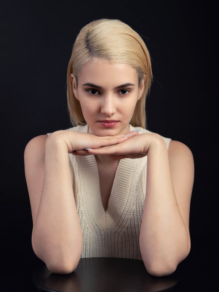 Contemplative Blonde Woman by Mihai Bogdan R — canvas wall art