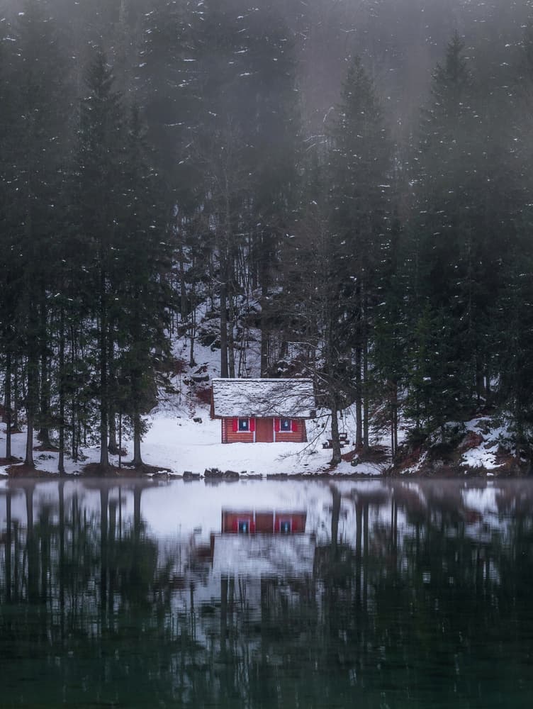 Red Cabin Winter Lake by Ales Krivec — canvas wall art