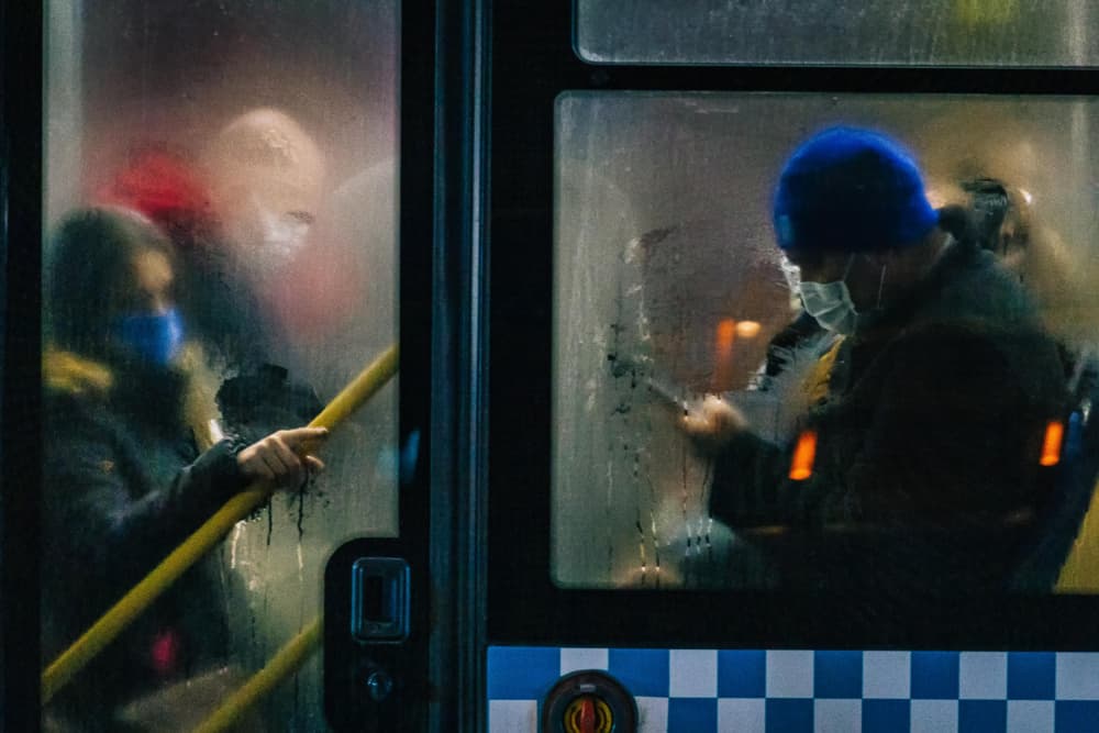 Masked Night Bus Ride by M. Emre Erol — canvas wall art