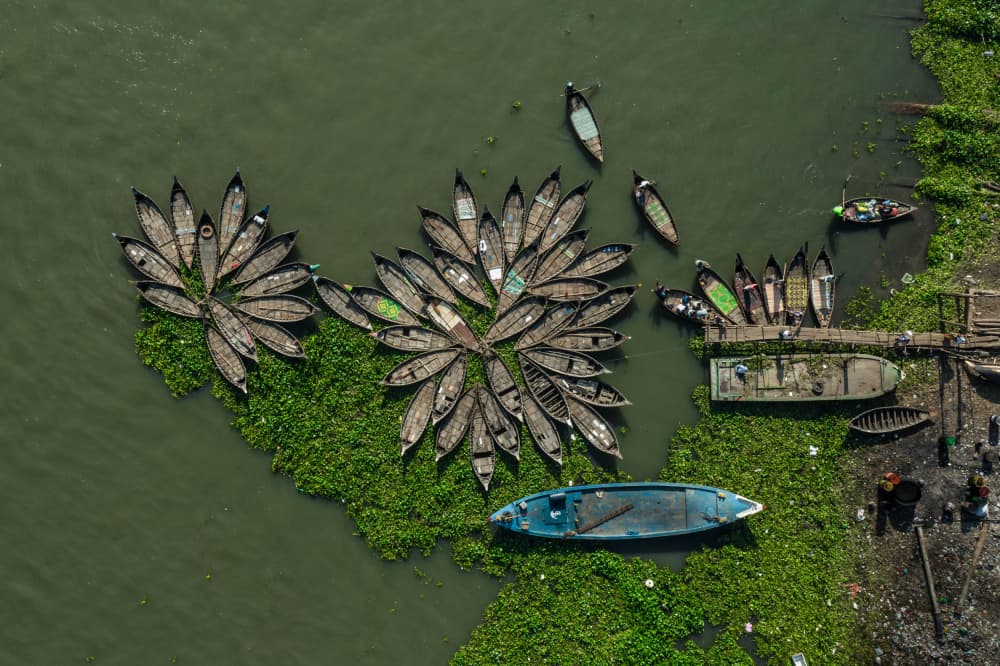 Floating Boat Circles by Anindita Roy — canvas wall art
