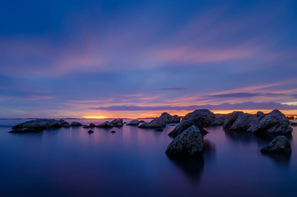 Serene Sunset Rocks by Srecko Jubic — canvas wall art