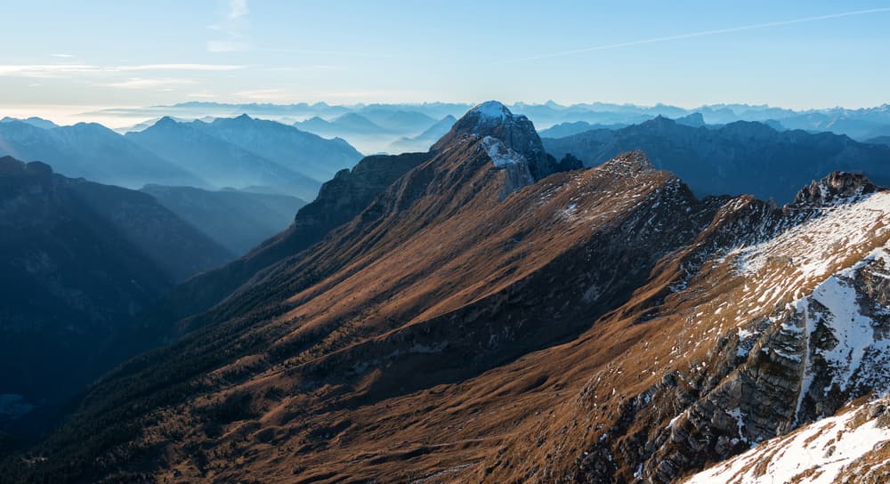 Sunlit Mountain Ridges by Ales Krivec — canvas wall art