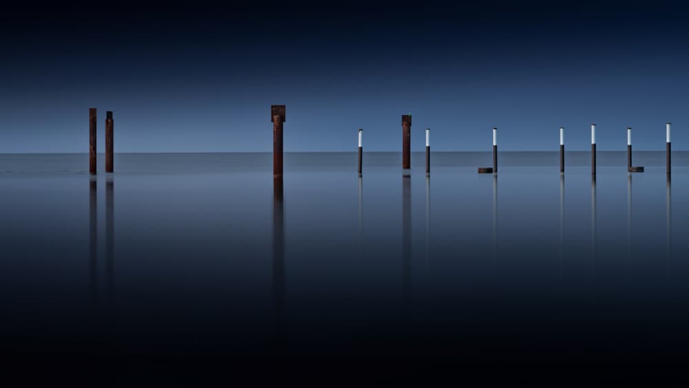Minimalist Ocean Pilings by Jürgen Muß — canvas wall art