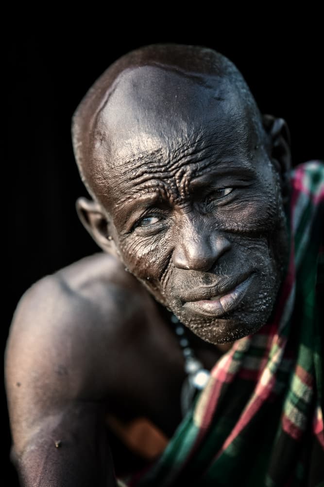 Jiye tribes man by Trevor Cole — canvas wall art