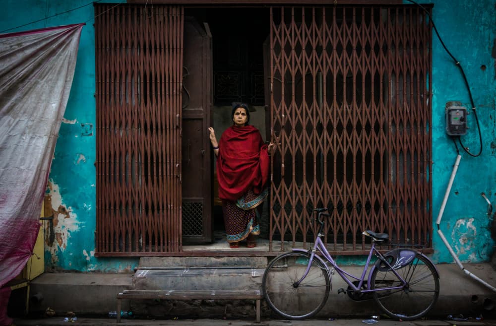 Indian Woman Rustic Doorway by Samara Ratnayake — canvas wall art