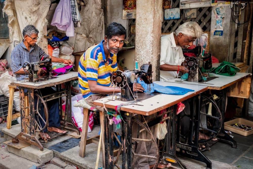 Indian Tailors At Work by Martin Steeb — canvas wall art