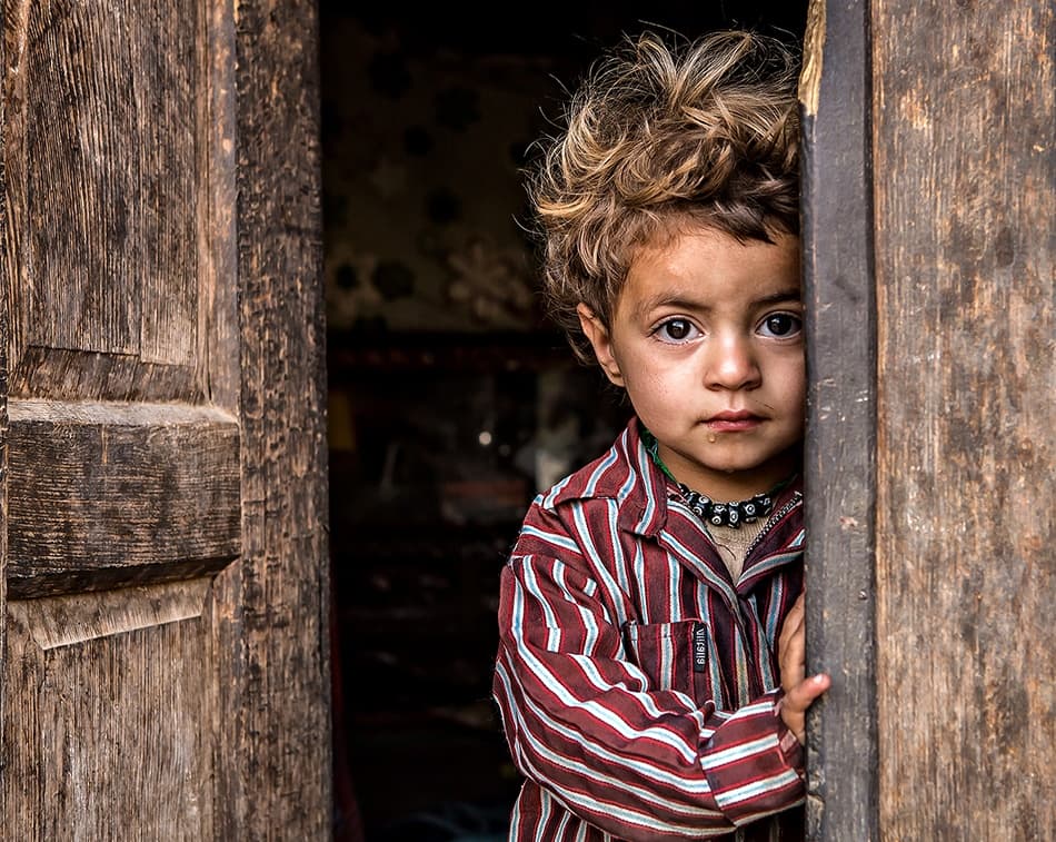 Curious Child Peeking by Mohammadreza Momeni — canvas wall art