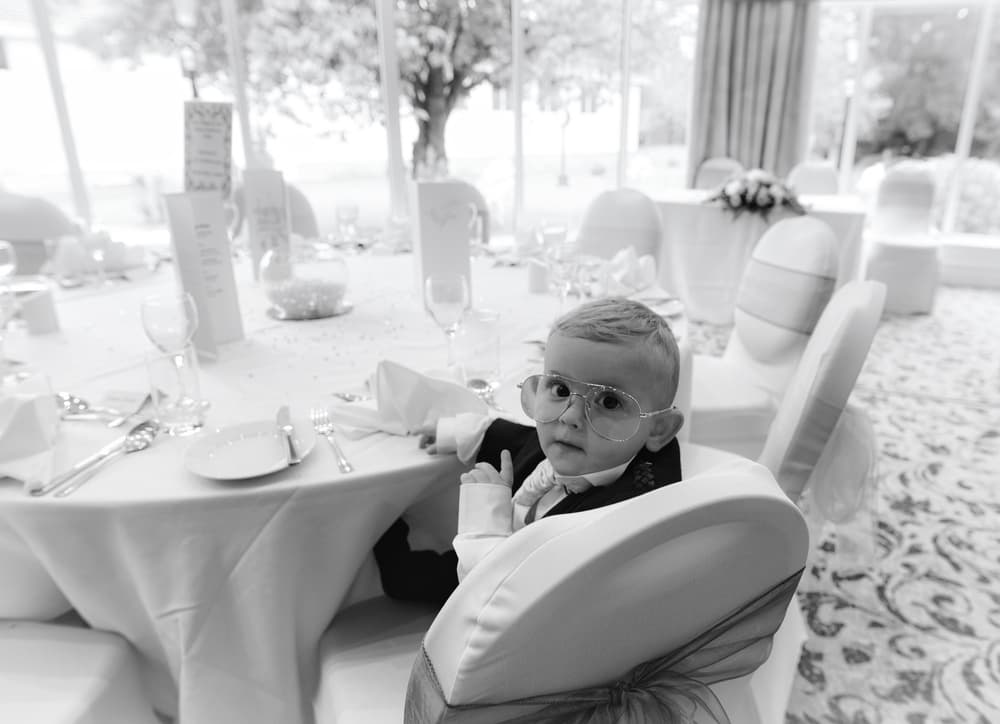 Dapper Baby in Glasses by Ray Clark — canvas wall art