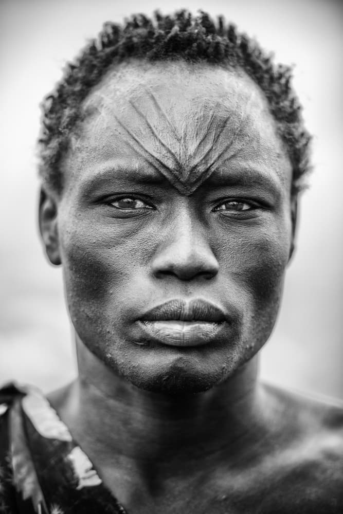 African Man Scarification by Trevor Cole — canvas wall art