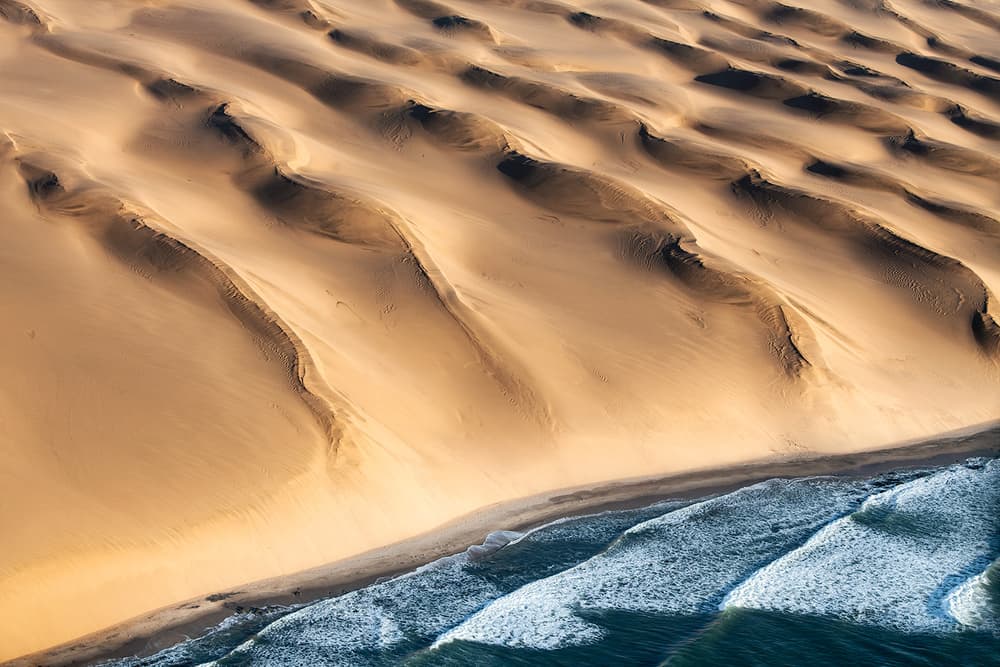Ocean Meets Desert Sands by Luigi Ruoppolo — canvas wall art