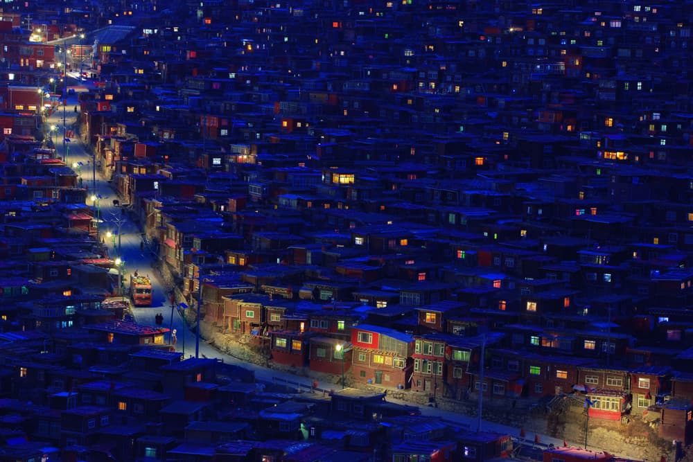 Glowing Hillside Village by Hesham Alhumaid — canvas wall art