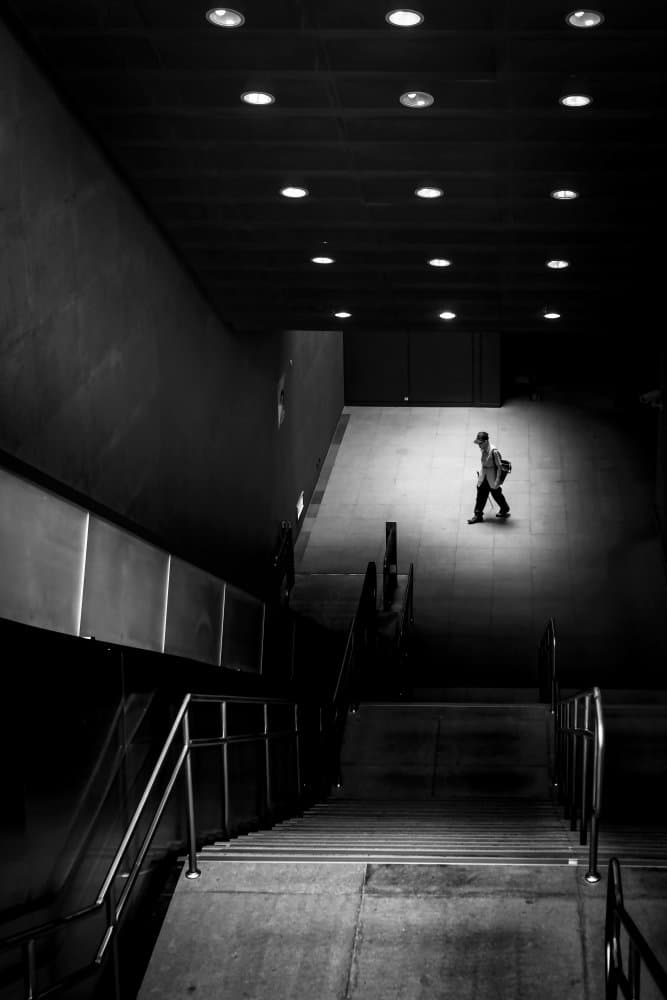 Man on Modern Stairs by Fengshou . Lin 林峰守 — canvas wall art