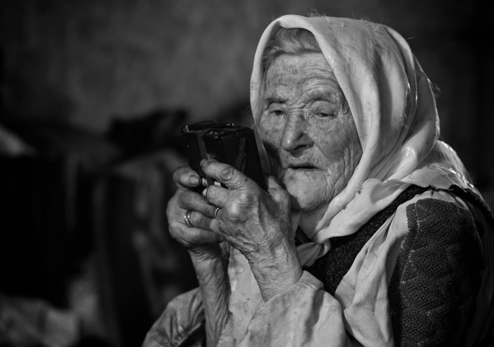 Elderly Woman Contemplating by Grigore Roibu — canvas wall art