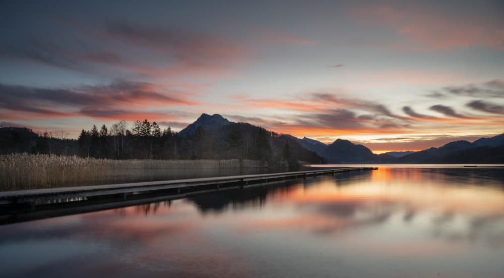 Vibrant Lake Sunset Reflection by Ulrike Eisenmann — canvas wall art