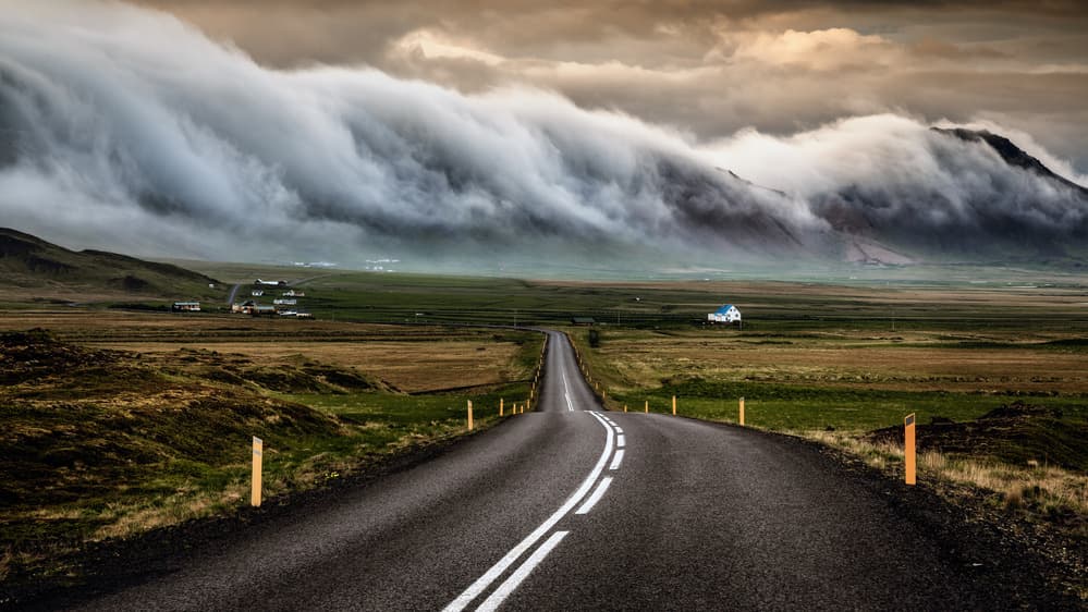 Winding Road Rolling Clouds by Sus Bogaerts — canvas wall art